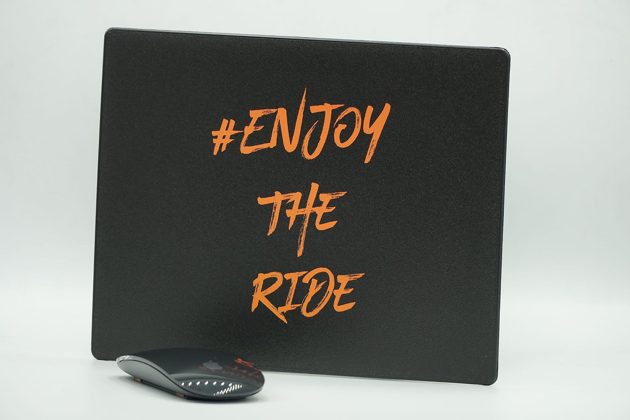 #EnjoyTheRide Black and Orange Recycled Tyre Mouse Mat